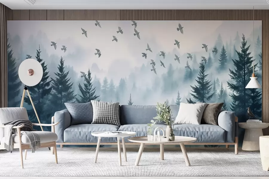 murales de pared Tranquilo bosque de niebla con árboles en tonos azules y bandadas de pájaros volando en el cielo w08664